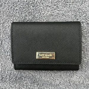 Like new Kate Spade card case in black.